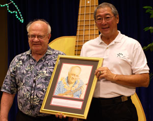 Byron Yasui presenting Lyle with his ʻUkulele Hall of Fame portrait at the Portland Ukulele Festival, June 2007